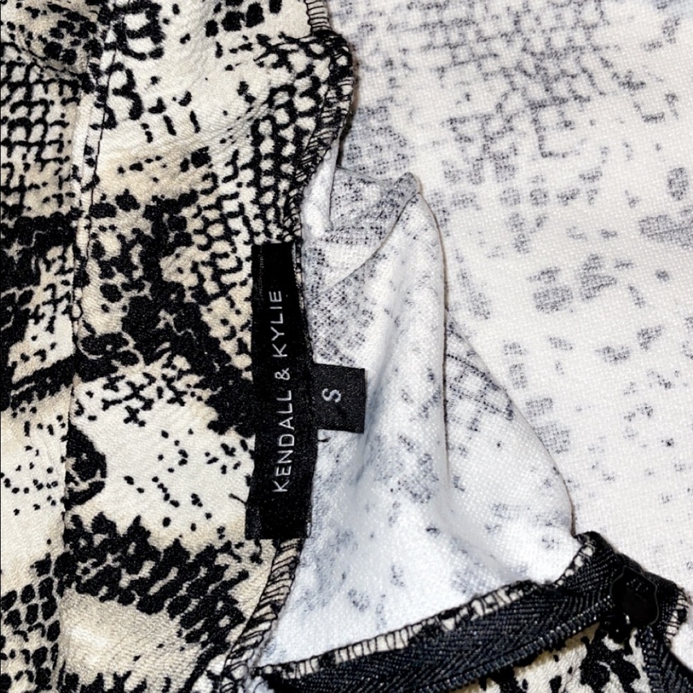 This is a snake skin tight fitting skirt